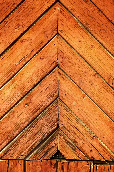 Tablones de madera viejos con un fondo marrón — Foto de Stock