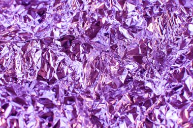Holografik yanardöner metal folyo. Buruşuk soyut folyo 80s doku birden çok colors.purple doku ile gerçek Hologram arka plan