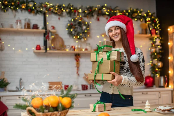 portrait of a happy young girl. preparing for Christmas and pack