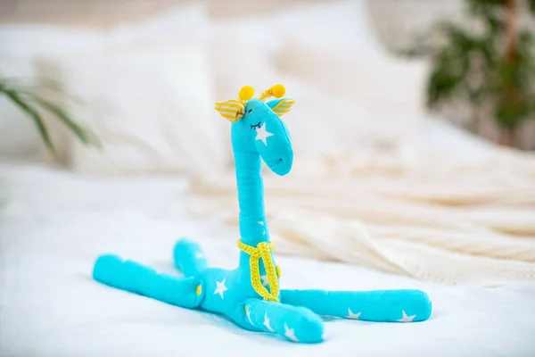 toy giraffe, sewn and handmade fabrics. a piece of furniture, a decorative product giraffe. children's toy animal Africa.