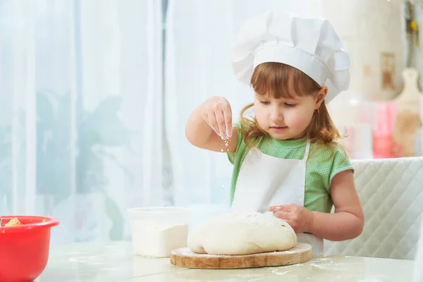 Cute Little Girl Rolls Out Dough Rolling Pin Kitchen She — Stock Photo, Image