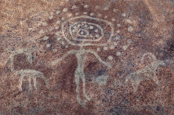 Un dibujo en una cueva pintado por un cavernícola. Neandertal, primitivo, aborigen . — Foto de Stock