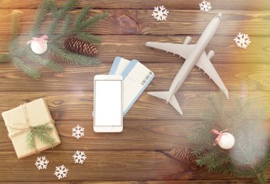 Smartphone uçak biletleri. Noel, yeni yıl tatil