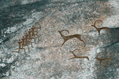 Mağara çizimleri. Tarih öncesi insan av hayvanları. Mağara adamı, Neandertal, ilkel, Aborijin. Taş Devri.