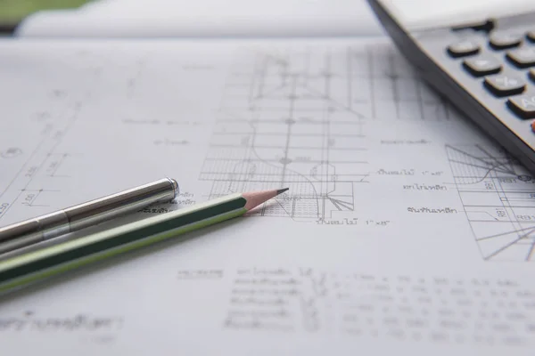 Pencil  pen and calculator on blueprints. Architectural and engineering housing concept — Stock Photo, Image