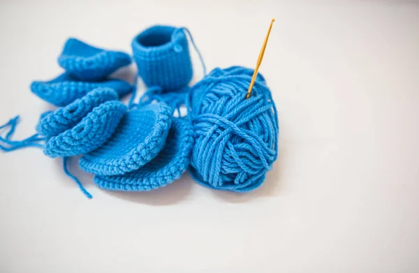 Closeup blue knitting on White background — Stock Photo, Image