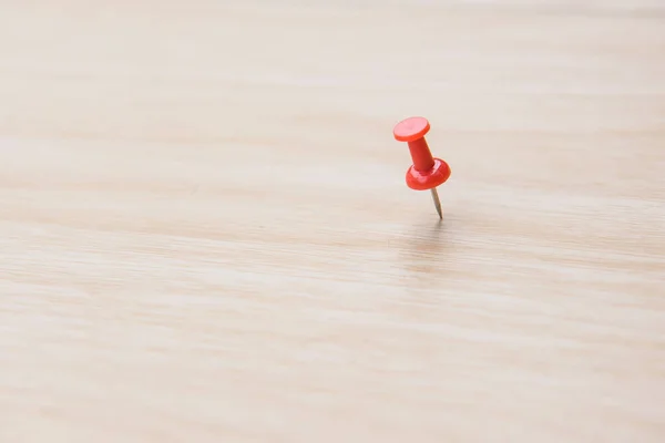 Colorful  push pin marking on wooden floor for background — Stock Photo, Image