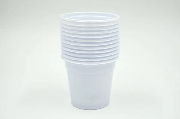 empty white plastic cup isolated on white background of file with Clipping Path .
