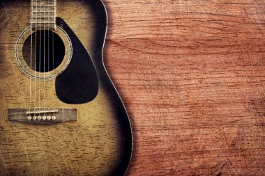 Ahşap arka plan vintage gitar