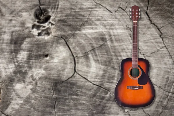 Akusztikus gitár fa háttér. vintage stílusú. — Stock Fotó