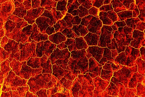 Teplo červená popraskané pozemní textury po erupci sopky — Stock fotografie