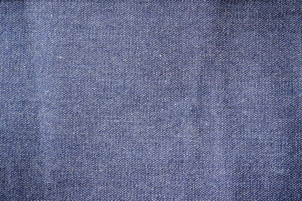 Calça jeans jeans azul fechado textura . — Fotografia de Stock