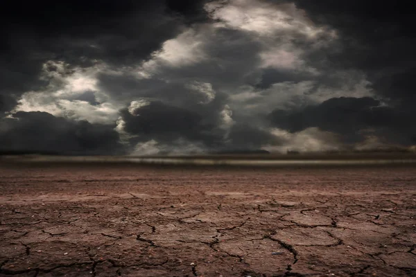 Land to the ground dry cracked with storm. Stock Picture