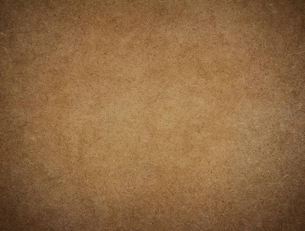 abstract brown background or brown paper with warm center