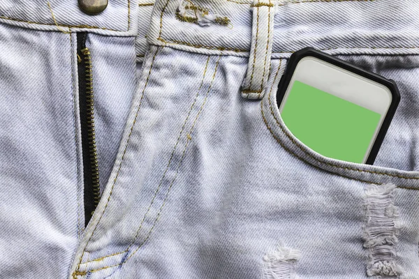 jeans and mobile phone green screen. Phone in your pocket jeans