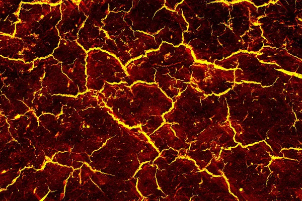 Calore rosso incrinato terra texture dopo eruzione vulcano — Foto Stock