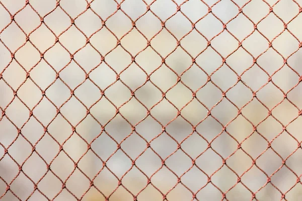 Wire netting as background over earth — Stock Photo, Image