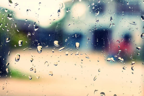 Kapky deště na pozadí skla s vintage tóny — Stock fotografie