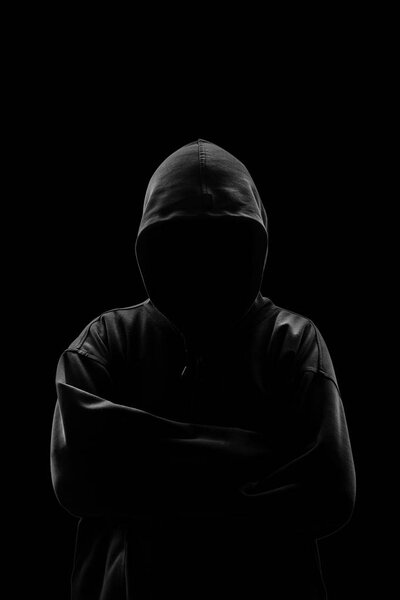 Silhouette of a hacker isloated on black background