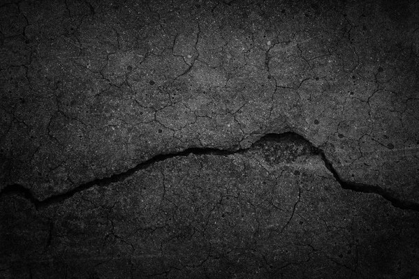 Crack achtergrond textuur van ruw asfalt — Stockfoto