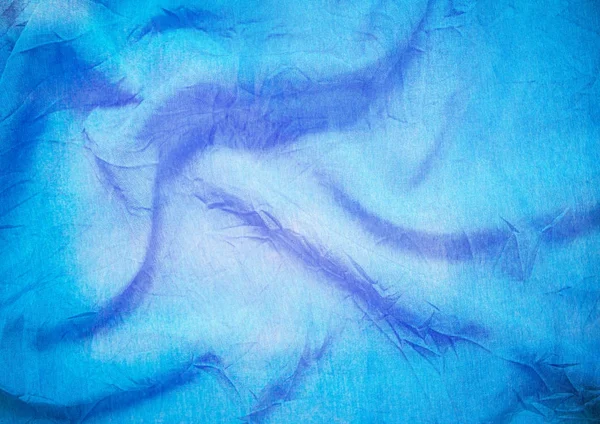 Creased cloth blue background