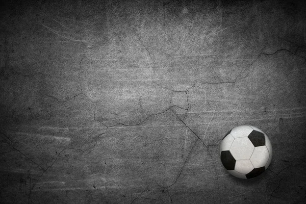 Футбол на черном фоне . — стоковое фото