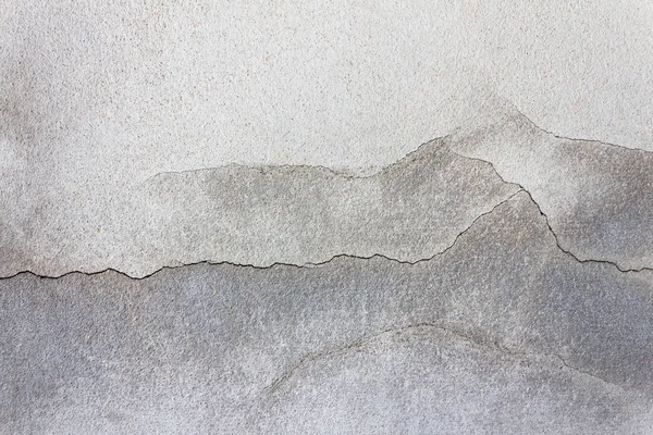 Elegante split barst in grijze steen textuur achtergrond — Stockfoto