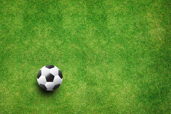 Pelota de fútbol en el césped vista superior —  Fotos de Stock
