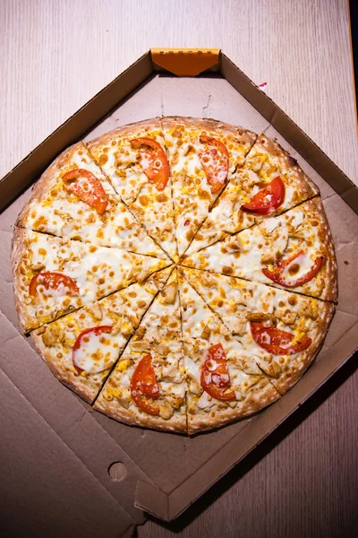 Pizza in delivery box