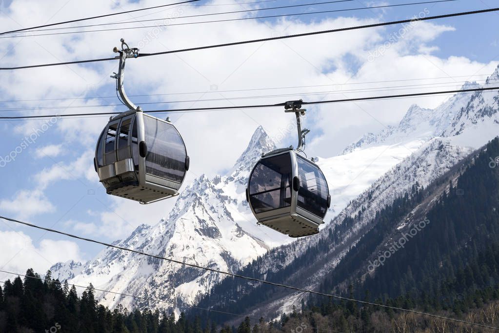 cabin of the cable car on a background of mountains