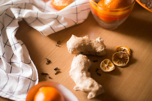 Ginger root with cloves and tangerines