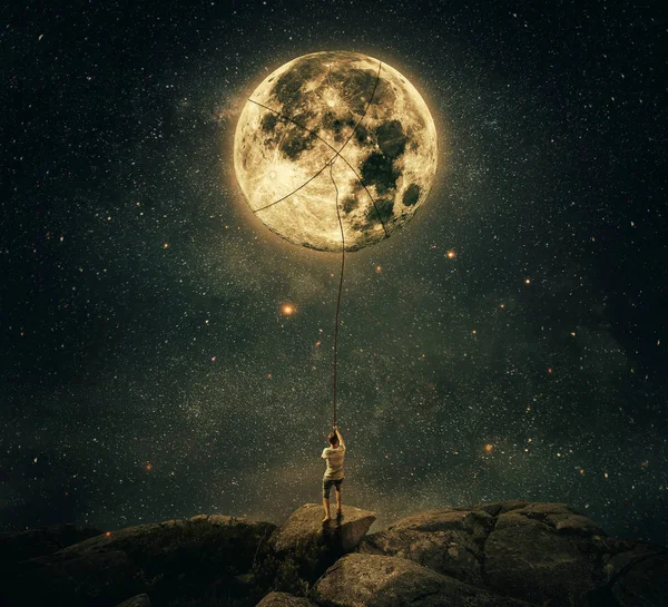 Pulling the moon — Stock Photo, Image