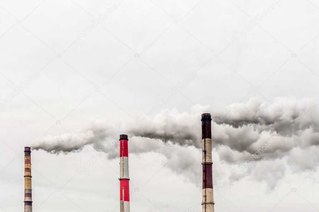concept environmental pollution. smoke from a pipe