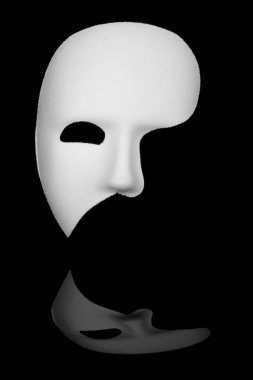 White phantom of the opera half face mask isolated on black background clipart