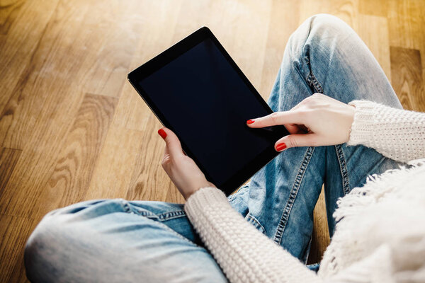 top view of a woman with a tablet