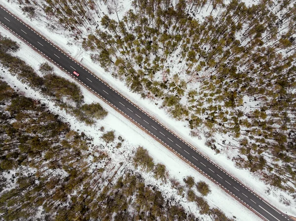 Forest road in winter view from above — Stock Photo, Image