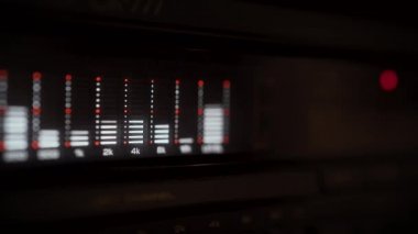 equalizer display with flashing frequency levels