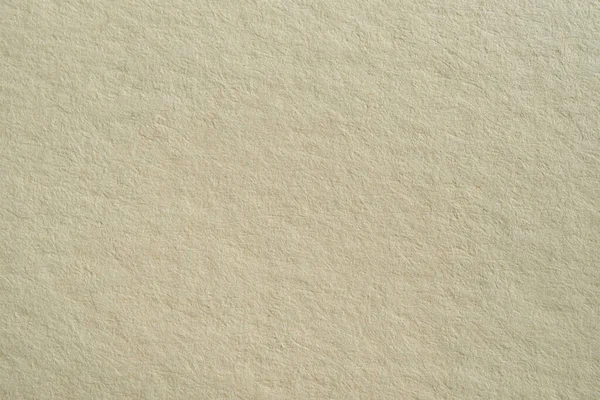 Textuur textuur van beige handgeschept papier in macro — Stockfoto