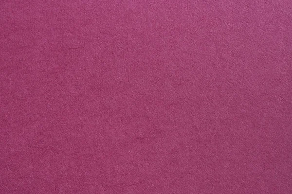 Textuur textuur van magenta handgeschept papier in macro — Stockfoto