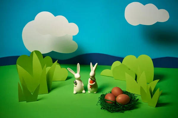 beautiful green spring background with easter rabbits