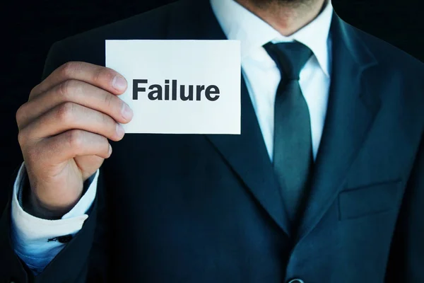 Businessman showing failure text. — Stock Photo, Image
