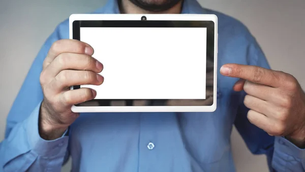 Man showing digital tablet. Stock Picture