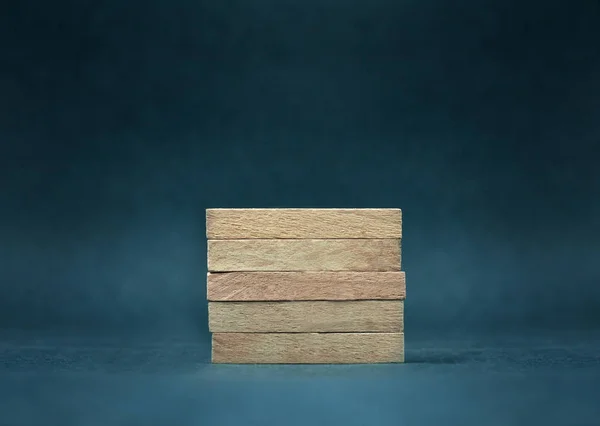 Trä block på den blå bakgrunden. — Stockfoto