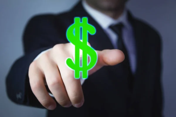 Die Hand des Geschäftsmannes berührt ein Dollarzeichen. — Stockfoto