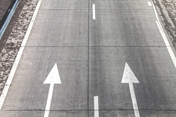 Arrow signs on asphalt. — Stock Photo, Image