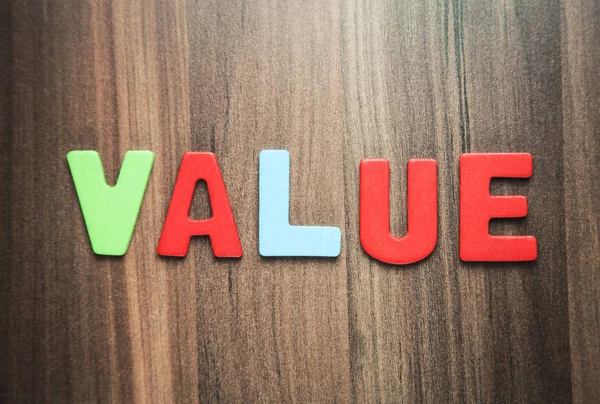 Colorful word Value on wooden background. — Stock Photo, Image