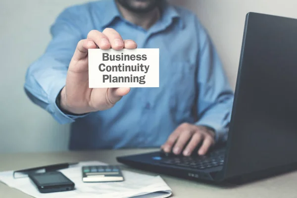 Businessman showing text Business Continuity Planning on busines — Stock Photo, Image