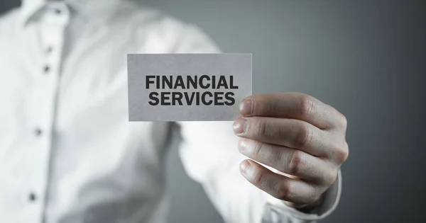 Man Holding Business Card Financial Services — Stock Photo, Image