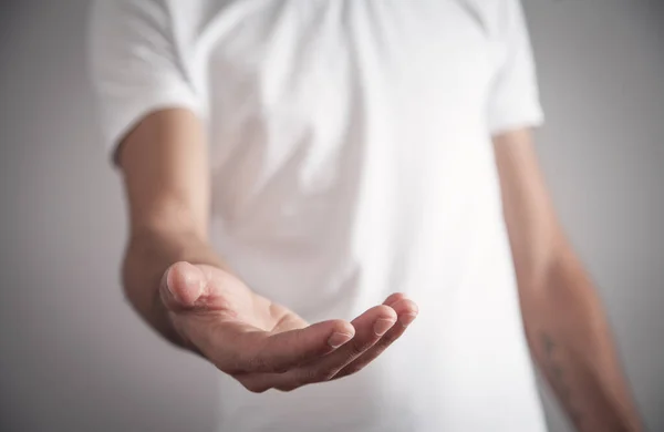 Man Showing Empty Hand Giving Gesture — Stock Photo, Image