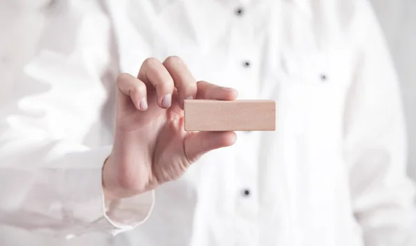 Girl Hand Holding Empty Wooden Block — Stock Photo, Image